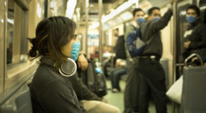 Swine_Flu_Masked_Train_Passengers_in_Mexico_City-620x342